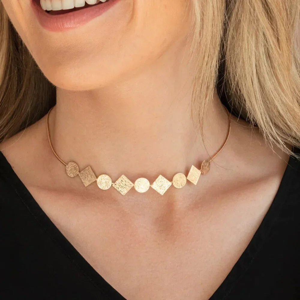 Paparazzi Jewelry - Dont Get Bent Out Of Shape - Gold Necklace - Vintage